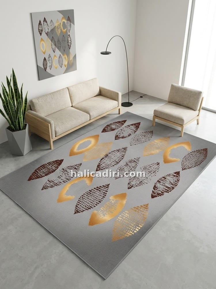 Gri zeminde gold desenleriyle ışığı yansıtan modern bambu ipek halı